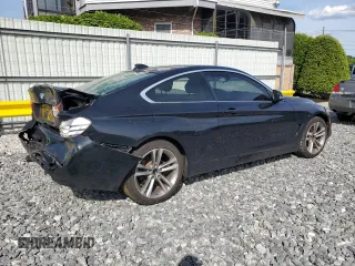 2016 BMW 4 Series 428i xDrive with VIN WBA3N9C54GK250508, listed as a Copart auction lot 58236065 with 98,505 mi miles and Salvage title. Bid and sale history available at DreamBid. Image 3.