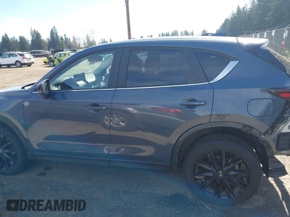 2023 Mazda CX-5 2.5 S Carbon Edition with VIN JM3KFBCM8P0134757, listed as a IAAI auction lot 41893648 with 9,587 mi miles. Bid and sale history available at carsss.com. Image 15.