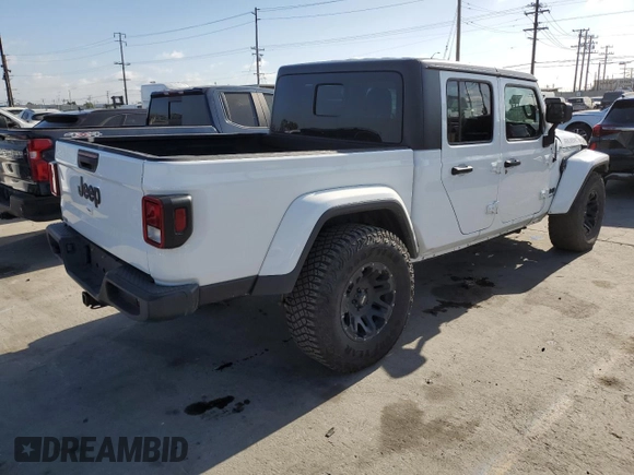2021 Jeep Gladiator Sport S with VIN 1C6HJTAG3ML508147, listed as a Copart auction lot 56986865 with 43,407 mi miles and Salvage title. Bid and sale history available at DreamBid. Image 3.