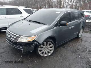 2012 Honda Odyssey Touring with VIN 5FNRL5H98CB089871, listed as a IAAI auction lot 41351447 with 999,999 mi miles. Bid and sale history available at carsss.com. Image 16.
