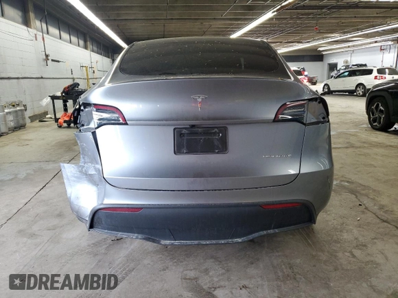 2024 Tesla Model Y Long Range with VIN 7SAYGDEE2RA299824, listed as a Copart auction lot 56040835 with 16,534 mi miles and Salvage title. Bid and sale history available at DreamBid. Image 6.