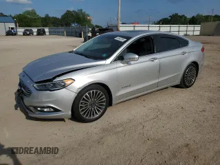 2017 Ford Fusion Hybrid Titanium with VIN 3FA6P0RU5HR388758, listed as a Copart auction lot 54942355 with 137,427 mi miles and Salvage title. Bid and sale history available at DreamBid. Image 1.