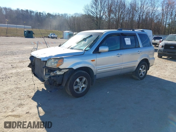 2006 Honda Pilot EX-L with VIN 5FNYF18786B030253, listed as a IAAI auction lot 41708620 with 146,713 mi miles and . Bid and sale history available at DreamBid. Image 2.