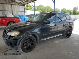 2012 BMW X5 35d with VIN 5UXZW0C57CL667310, listed as a Copart auction lot 60786255 with 220,407 mi miles and Salvage title. Bid and sale history available at DreamBid. Image 1.