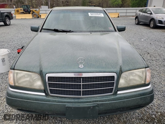 1995 Mercedes-Benz C 230/260/280/320 with VIN WDBHA28E3SF241951, listed as a Copart auction lot 50332845 with 236,068 mi miles and Salvage title. Bid and sale history available at DreamBid. Image 5.