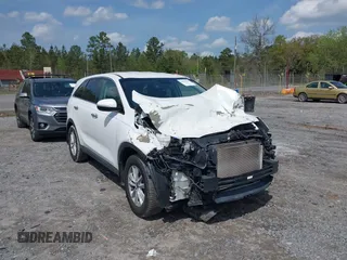 2019 Kia Sorento LX with VIN 5XYPG4A32KG551151, listed as a IAAI auction lot 41883260 with 126,600 mi miles and . Bid and sale history available at carsss.com. Image 1.