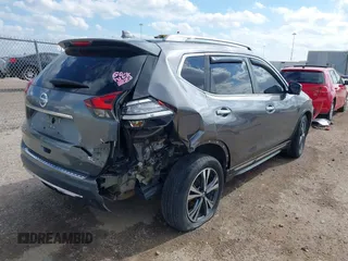 2017 Nissan Rogue SL z VIN 5N1AT2MT0HC881736, wystawiony jako IAAI lot #41506635 z przebiegiem 136 389 mil mil oraz . Historia ofert i sprzedaży dostępna na DreamBid. Obrazek 4.