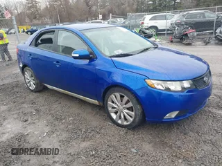 2010 Kia Forte SX with VIN KNAFW4A38A5142042, listed as a IAAI auction lot 41711307 with 162,765 mi miles. Bid and sale history available at carsss.com. Image 1.