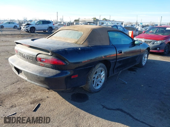1996 Chevrolet Camaro Z28 z VIN 2G1FP32PXT2166409, wystawiony jako IAAI lot #41264761 z przebiegiem 143 820 mil mil oraz . Historia ofert i sprzedaży dostępna na DreamBid. Obrazek 4.