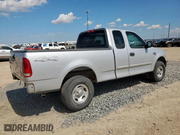 2004 Ford F-150 XL with VIN 2FTRX18WX4CA54373, listed as a Copart auction lot 63733095 with Not provided miles and Salvage title. Bid and sale history available at DreamBid. Image 3.