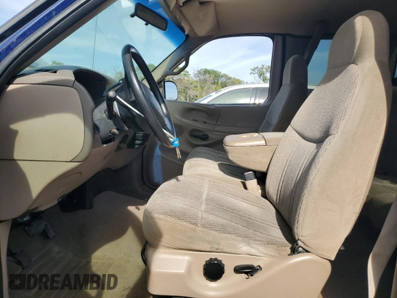 1998 Ford F-150 с VIN 1FTZX18W5WKB98492, выставлен на аукционе Copart как лот 73586864 с пробегом 174 316 миль миль и Списание • Salvage title. История ставок и продаж доступна на DreamBid. Изображение 7.