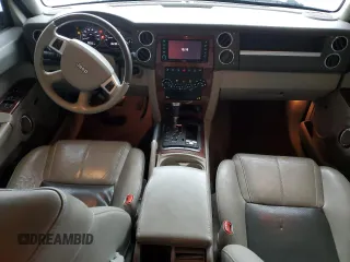 2010 Jeep Commander Limited with VIN 1J4RG5GT0AC137563, listed as a Copart auction lot 54178235 with 146,196 mi miles and Salvage title. Bid and sale history available at DreamBid. Image 8.