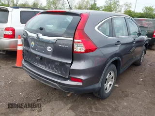 2015 Honda CR-V LX with VIN 5J6RM4H38FL042550, listed as a IAAI auction lot 42119148 with 204,104 mi miles and . Bid and sale history available at DreamBid. Image 4.