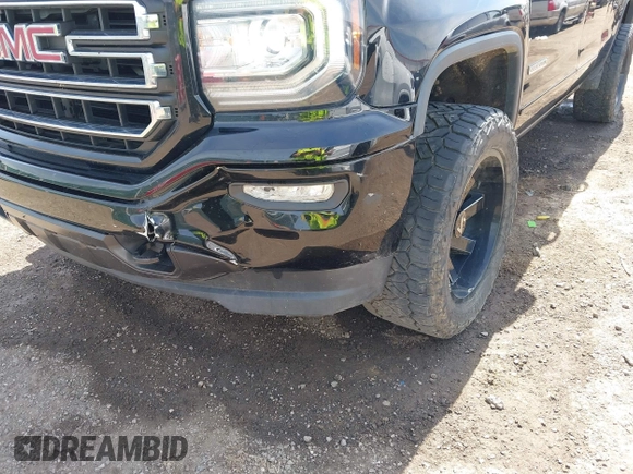 2017 GMC Sierra 1500 SLE z VIN 1GTV2MEC2HZ105964, wystawiony jako IAAI lot #42091941 z przebiegiem 93 779 mil mil oraz . Historia ofert i sprzedaży dostępna na DreamBid. Obrazek 6.