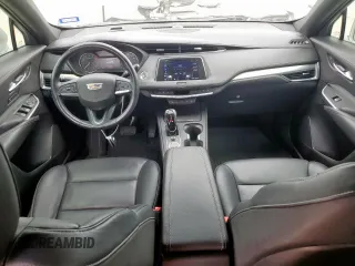 2020 Cadillac XT4 FWD Premium Luxury z VIN 1GYFZCR42LF115413, wystawiony jako Copart lot #56746785 z przebiegiem 41 296 mil mil oraz Szkody całkowita. Historia ofert i sprzedaży dostępna na DreamBid. Obrazek 8.