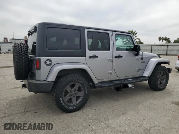 2016 Jeep Wrangler Unlimited Sport z VIN 1C4BJWDG5GL179046, wystawiony jako Copart lot #52989725 z przebiegiem 129 051 mil mil oraz Szkoda całkowita • Salvage title. Historia ofert i sprzedaży dostępna na DreamBid. Obrazek 3.