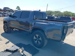 2017 Toyota Tacoma SR5 z VIN 3TMCZ5AN4HM052380, wystawiony jako IAAI lot #42277918 z przebiegiem 62 238 mil mil oraz . Historia ofert i sprzedaży dostępna na DreamBid. Obrazek 3.