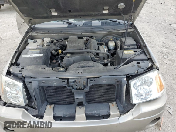 2002 GMC Envoy SLT with VIN 1GKDT13SX22380133, listed as a Copart auction lot 69816144 with 90,060 mi miles and Salvage Title. Bid and sale history available at DreamBid. Image 12.