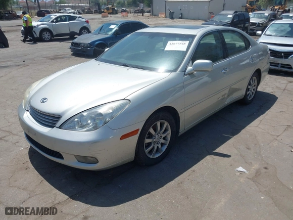 2004 Lexus ES 330 with VIN JTHBA30G745005515, listed as a IAAI auction lot 42077548 with 124,123 mi miles. Bid and sale history available at carsss.com. Image 2.