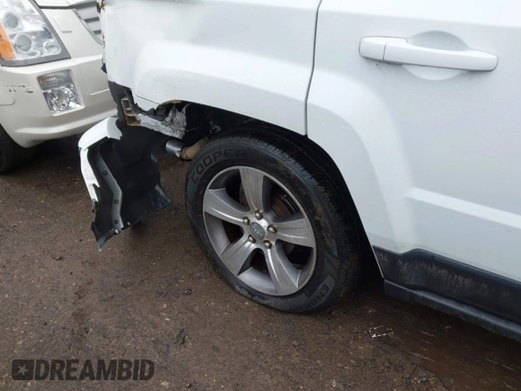 2016 Jeep Patriot Latitude with VIN 1C4NJPFAXGD749306, listed as a IAAI auction lot 41474439 with 94,767 mi miles and . Bid and sale history available at DreamBid. Image 19.