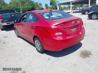 2015 Hyundai Accent GLS with VIN KMHCT4AE1FU801913, listed as a IAAI auction lot 42035825 with 104,701 mi miles. Bid and sale history available at carsss.com. Image 3.
