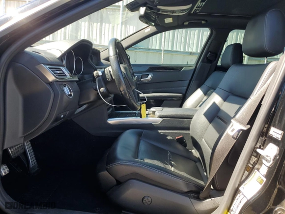 2015 Mercedes-Benz E-Class E 250 BlueTEC Luxury with VIN WDDHF0EB0FB149099, listed as a Copart auction lot 73056304 with 99,434 mi miles and Salvage Title. Bid and sale history available at carsss.com. Image 7.