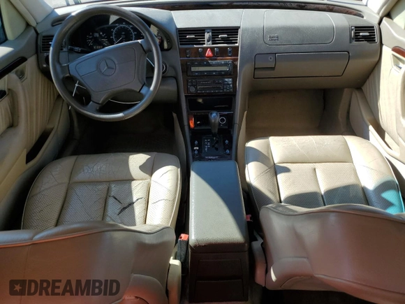 1997 Mercedes-Benz C with VIN WDBHA23EXVF507185, listed as a Copart auction lot 73716364 with 167,171 mi miles and Salvage title. Bid and sale history available at DreamBid. Image 8.
