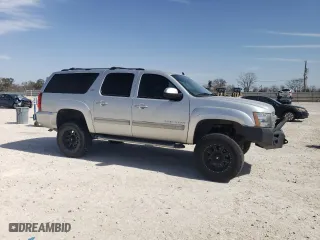 2013 Chevrolet Suburban LT with VIN 1GNSKJE74DR366339, listed as a Copart auction lot 47167315 with 113,106 mi miles and Salvage Title. Bid and sale history available at carsss.com. Image 4.