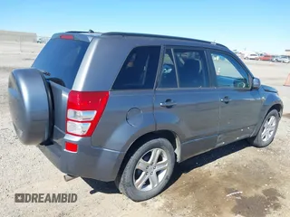 2006 Suzuki Grand Vitara Luxury z VIN JS3TE947164104381, wystawiony jako IAAI lot #41665094 z przebiegiem 145 874 mil mil oraz . Historia ofert i sprzedaży dostępna na DreamBid. Obrazek 4.