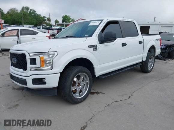 2018 Ford F-150 XL with VIN 1FTEW1E54JFB51565, listed as a IAAI auction lot 41942276 with 131,864 mi miles. Bid and sale history available at carsss.com. Image 18.