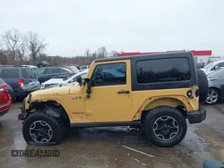 2013 Jeep Wrangler Rubicon 10th Anniversary with VIN 1C4BJWCG5DL688504, listed as a IAAI auction lot 41797184 with 109,414 mi miles and . Bid and sale history available at DreamBid. Image 6.