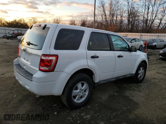 2010 Ford Escape XLS with VIN 1FMCU9C71AKC41887, listed as a Copart auction lot 87117884 with 126,687 mi miles and Clean title. Bid and sale history available at DreamBid. Image 3.