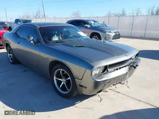 2012 Dodge Challenger SXT Plus with VIN 2C3CDYAG1CH262352, listed as a IAAI auction lot 41662002 with 141,868 mi miles. Bid and sale history available at carsss.com. Image 1.