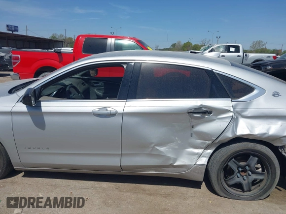 2019 Chevrolet Impala LS with VIN 2G11X5SA3K9129063, listed as a IAAI auction lot 41830720 with 130,766 mi miles and . Bid and sale history available at DreamBid. Image 13.