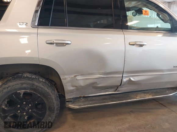 2016 Chevrolet Tahoe LTZ with VIN 1GNSKCKCXGR477284, listed as a IAAI auction lot 42221589 with Not provided miles and . Bid and sale history available at DreamBid. Image 16.