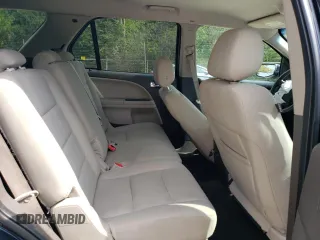 2008 Ford Taurus X SEL с VIN 1FMDK02W88GA44341, выставлен на аукционе Copart как лот 70535134 с пробегом 202 856 миль миль и Списание • Salvage title. История ставок и продаж доступна на DreamBid. Изображение 11.