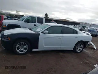2013 Dodge Charger SE with VIN 2C3CDXBG1DH742921, listed as a IAAI auction lot 41765001 with 196,783 mi miles and . Bid and sale history available at DreamBid. Image 15.