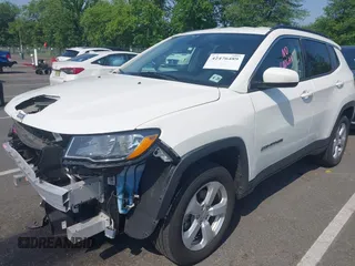 2020 Jeep Compass Latitude z VIN 3C4NJDBBXLT168695, wystawiony jako IAAI lot #42476489 z przebiegiem 23 213 mil mil oraz . Historia ofert i sprzedaży dostępna na DreamBid. Obrazek 17.