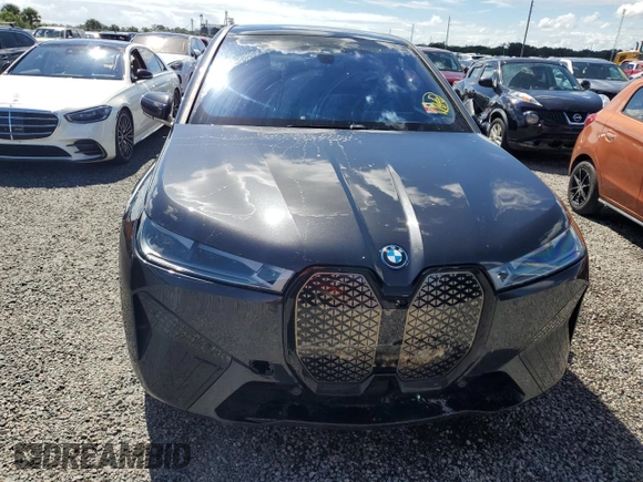 2024 BMW iX M60 z VIN WB533CF00RCN01751, wystawiony jako Copart lot #74145244 z przebiegiem 21 347 mil mil oraz Szkoda całkowita • Salvage title. Historia ofert i sprzedaży dostępna na DreamBid. Obrazek 5.