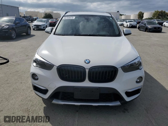 2017 BMW X1 sDrive28i with VIN WBXHU7C39H5H37756, listed as a Copart auction lot 50769975 with 82,479 mi miles and Salvage Title. Bid and sale history available at carsss.com. Image 5.