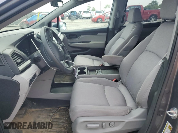 2019 Honda Odyssey EX with VIN 5FNRL6H50KB028595, listed as a Copart auction lot 65846434 with 77,596 mi miles and Salvage title. Bid and sale history available at DreamBid. Image 7.