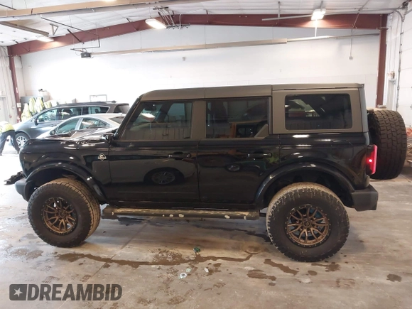 2022 Ford Bronco with VIN 1FMDE5DH0NLB06451, listed as a IAAI auction lot 42060509 with 55,624 mi miles and . Bid and sale history available at DreamBid. Image 14.