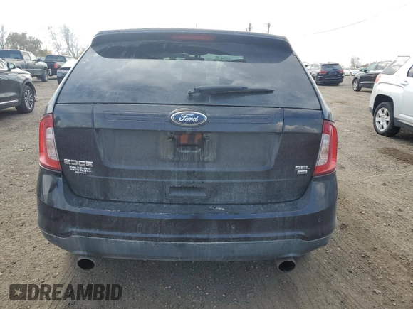 2013 Ford Edge SEL z VIN 2FMDK4JC4DBA69317, wystawiony jako Copart lot #77084544 z przebiegiem 108 808 mil mil oraz Szkoda całkowita • Salvage title. Historia ofert i sprzedaży dostępna na DreamBid. Obrazek 6.