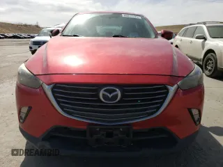 2017 Mazda CX-3 Grand Touring z VIN JM1DKFD74H0167026, wystawiony jako Copart lot #48817725 z przebiegiem 84 053 mil mil oraz Szkody całkowita. Historia ofert i sprzedaży dostępna na DreamBid. Obrazek 5.