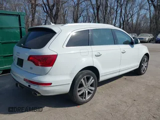 2014 Audi Q7 3.0L TDI Prestige with VIN WA1VMAFE2ED013300, listed as a IAAI auction lot 41801591 with 164,514 mi miles. Bid and sale history available at carsss.com. Image 4.
