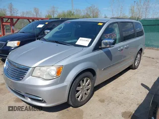 2011 Chrysler Town & Country Touring L with VIN 2A4RR8DG8BR797653, listed as a IAAI auction lot 42115304 with 185,613 mi miles and . Bid and sale history available at DreamBid. Image 22.