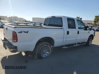 2003 Ford Super Duty F-250 XL with VIN 1FTNW21S93ED16066, listed as a Copart auction lot 73352924 with 250,741 mi miles and Salvage Title. Bid and sale history available at carsss.com. Image 3.