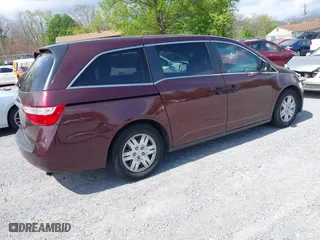 2011 Honda Odyssey LX with VIN 5FNRL5H28BB088074, listed as a IAAI auction lot 42033376 with 199,148 mi miles. Bid and sale history available at carsss.com. Image 4.
