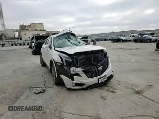 2021 Cadillac XT5 FWD Premium Luxury z VIN 1GYKNCR41MZ154357, wystawiony jako Copart lot #86819564 z przebiegiem Nie podano mil oraz Nie do naprawy • Non repairable. Historia ofert i sprzedaży dostępna na DreamBid. Obrazek 11.