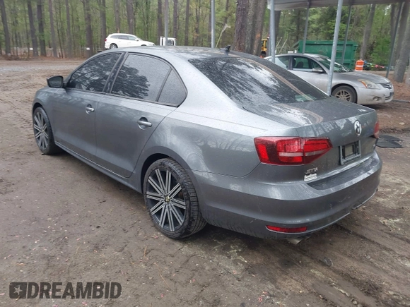 2016 Volkswagen Jetta Sedan 1.4T S w/Technology with VIN 3VW267AJ2GM397772, listed as a IAAI auction lot 41974226 with 64,631 mi miles. Bid and sale history available at carsss.com. Image 3.